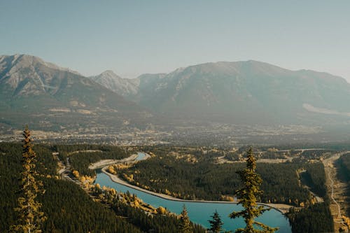 Aerial Photography of River Near Mountains