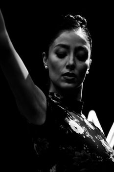 Graceful black and white portrait capturing elegance in dance.