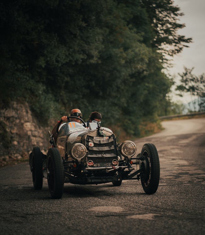 A Person Driving a Hot Rod · Free Stock Photo