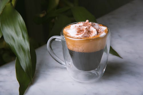 Free Espresso Coffee in a Clear Double Walled Glass Stock Photo