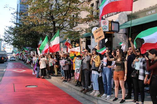 Free Crowd with Flags of Italy Protesting by Street Stock Photo