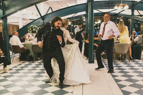 Bride and Groom Dancing Back to Back 