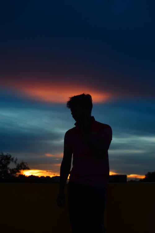 Silhouette of a Man during Sunset