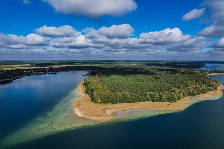 Green Island In Blue Water