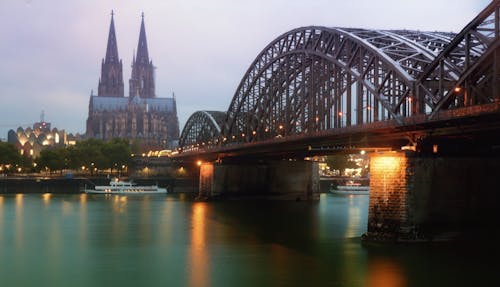 Free stock photo of arch bridge, cologne cathedral, color in water