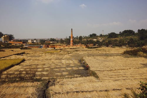 Brick Tower on Agricultural Field