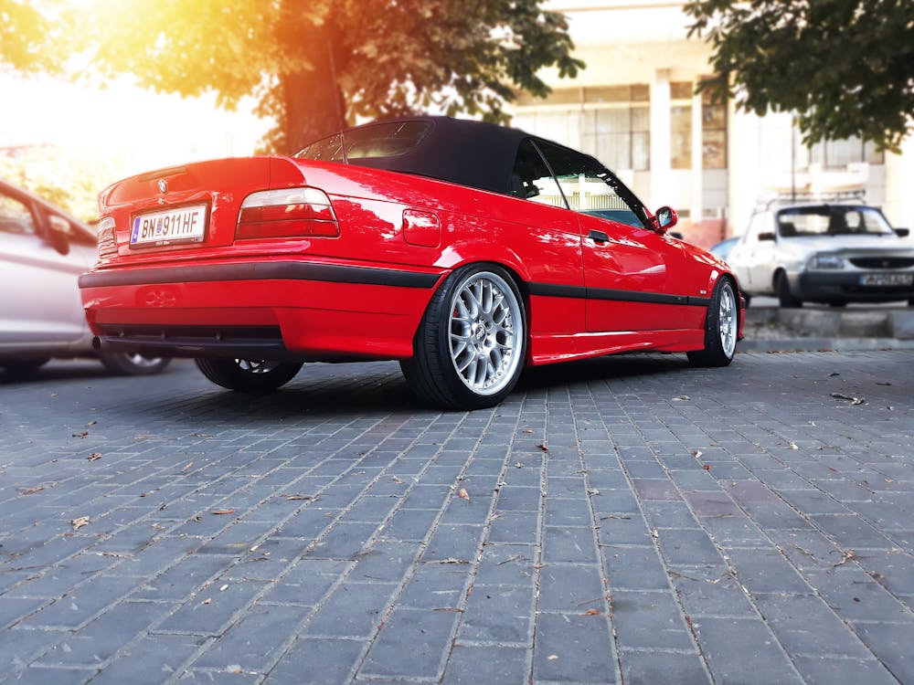 Free Red Bmw Coupe Parked on Road Stock Photo