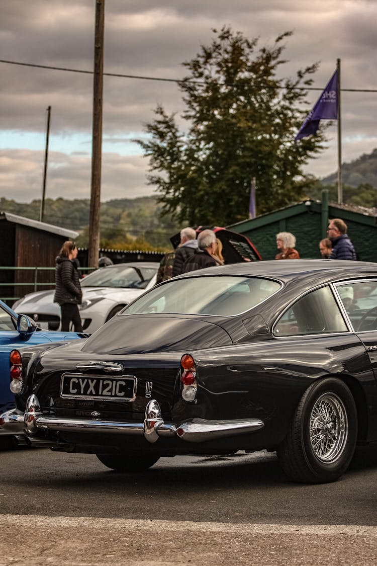 Vintage Car And People Near