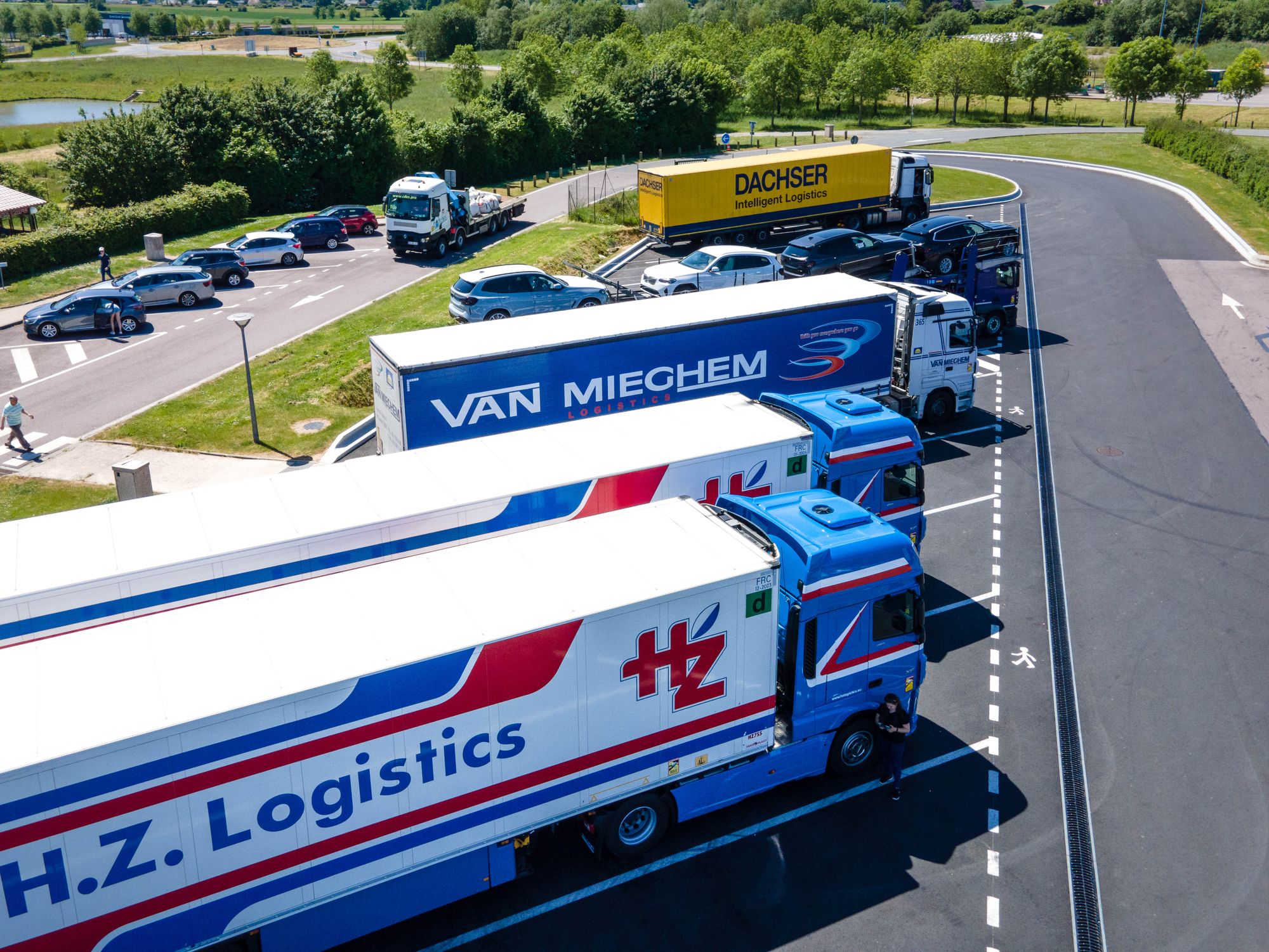 House Removals in Consett, North East — removals crew carrying furniture out to the removal lorry
