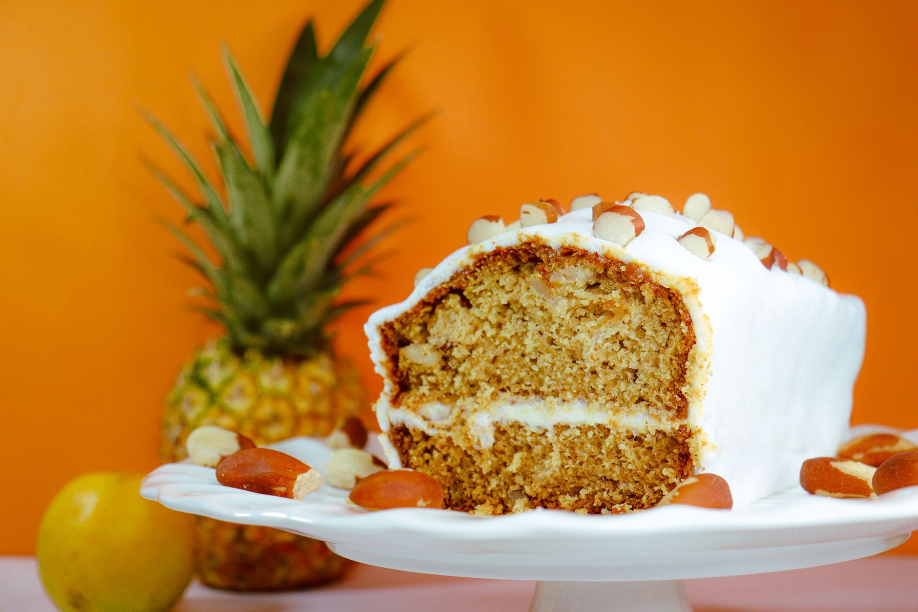 Close-up of a slice of pineapple cloud cake showing light, fluffy texture