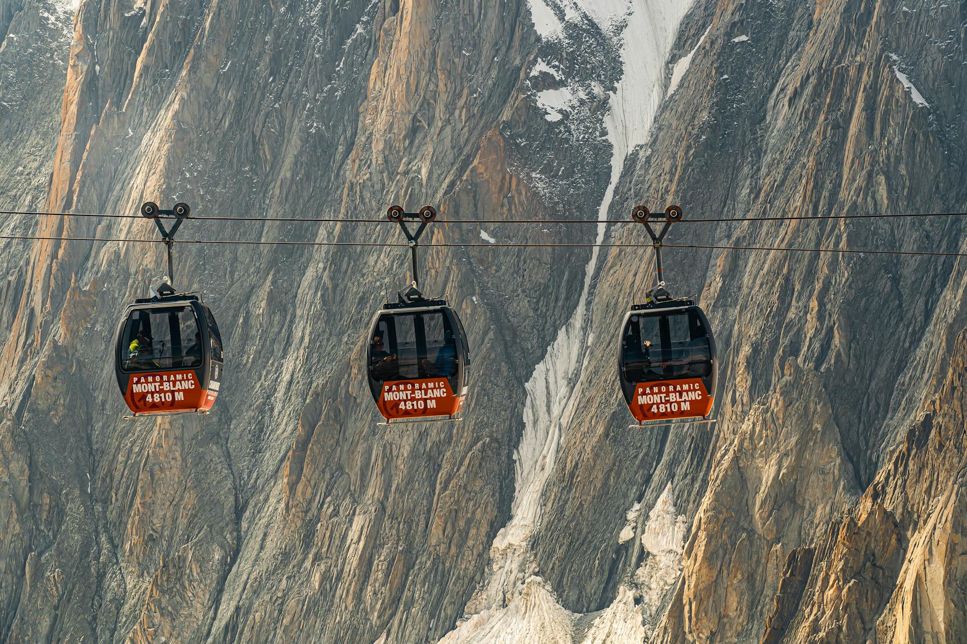 Red and Black Cable Cars