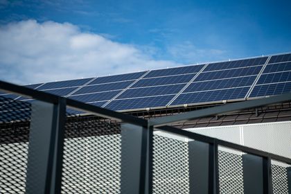 Rooftop solar panels against a clear sky, photo by Vladimir Srajber on Pexels