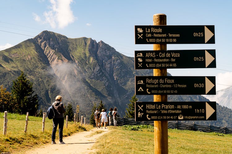 People Hiking In Mountains 