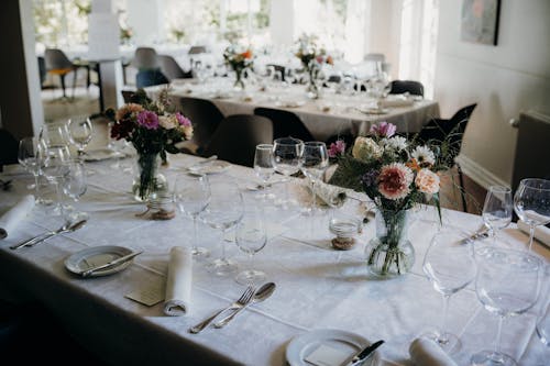 Tableware and Bouquets on Wedding Reception Tables 