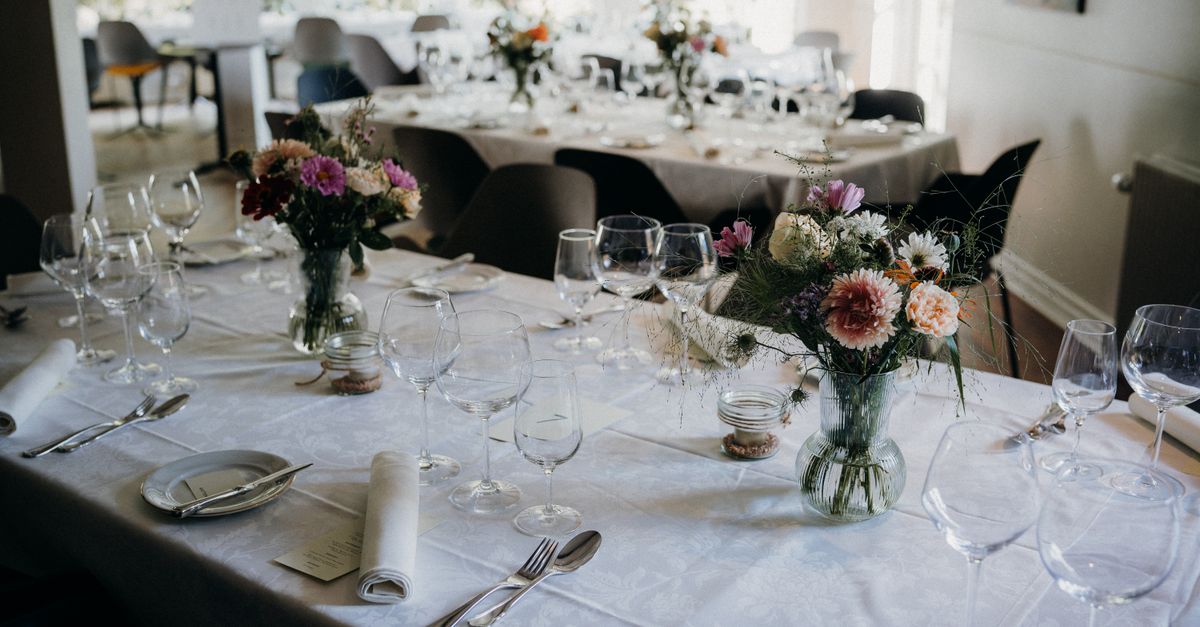 Reception Tableware Tableware and Bouquets on Wedding Reception Tables · Free Stock Photo
