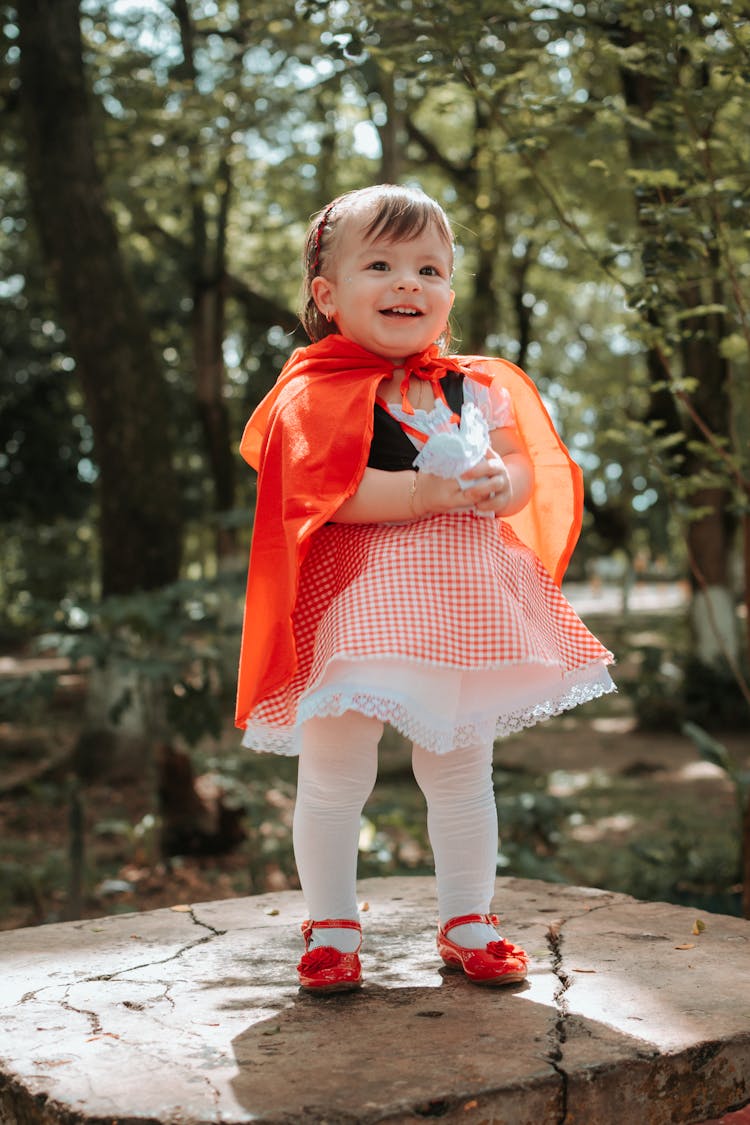 Portrait Of A Child In A Dress