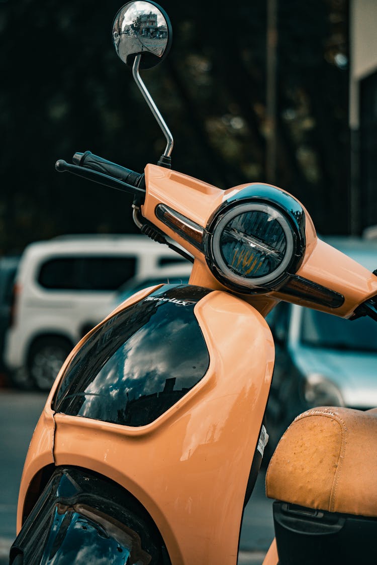 Orange And Black Scooter  In Tilt Shift Lens