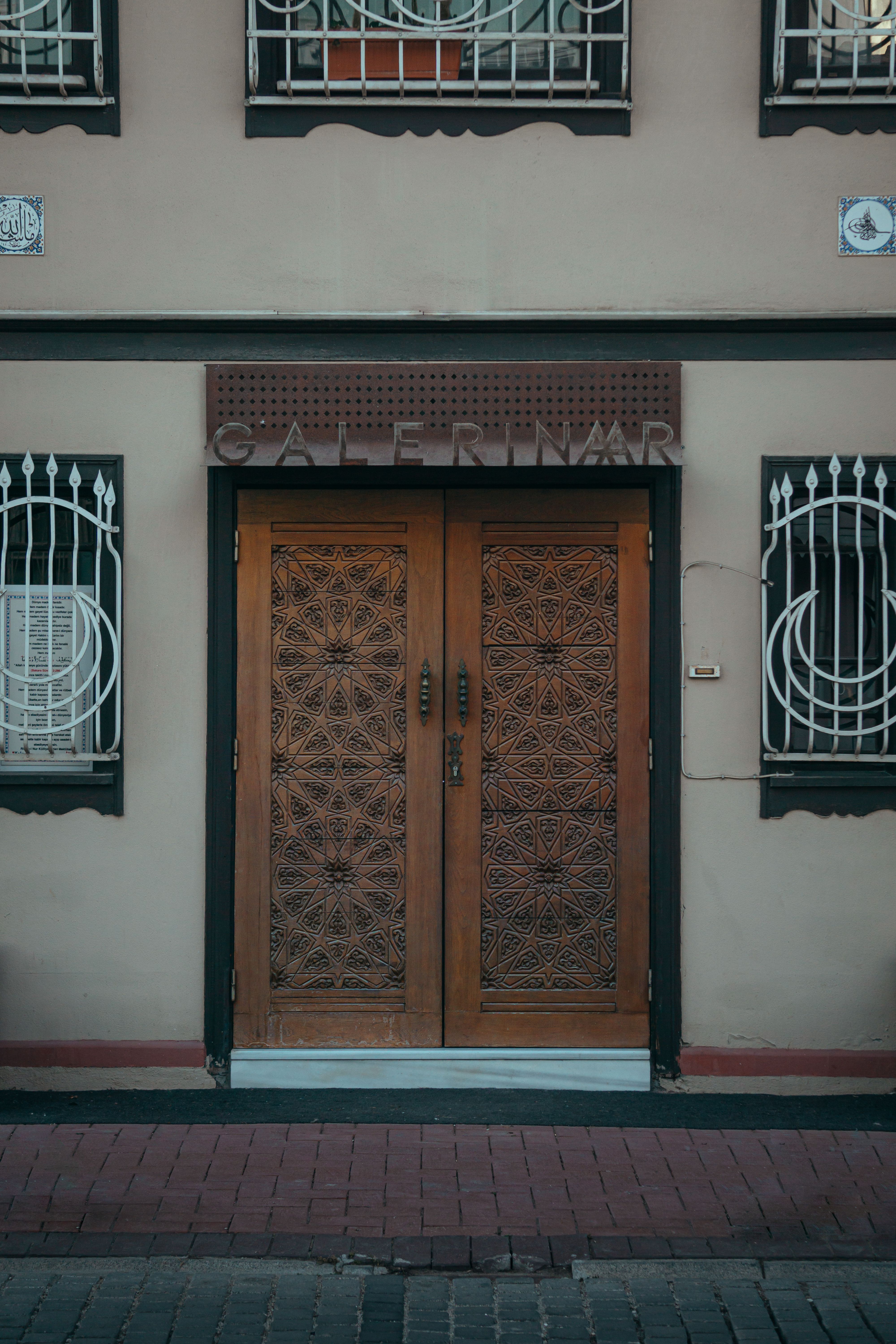 Ornate wooden doors in a traditional Turkish architecture style, Bursa.