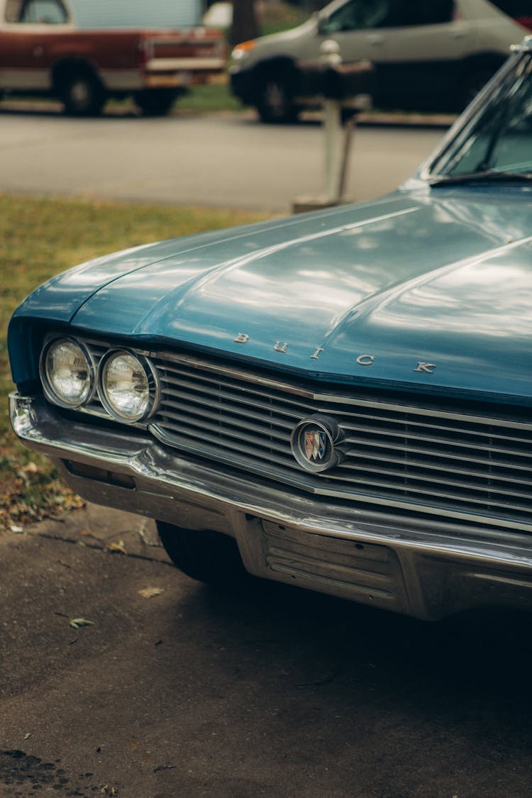 Close-up Of Blue Buick Car 