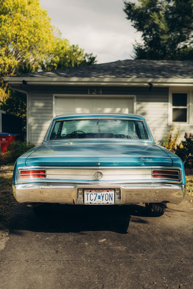 A Car Parked In Front Of A House