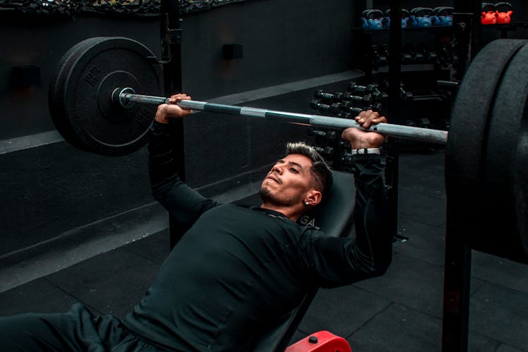 Photo Of Man Lifting A Barbell