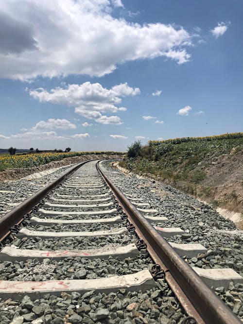 Foto profissional grátis de ferrovia, fotografia de paisagem, horizonte