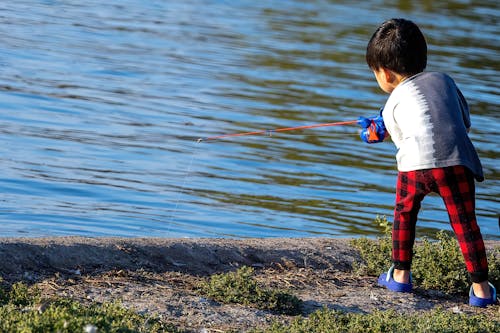 Photo of a Little Boy Fishing