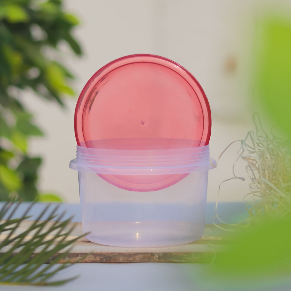 Airtight plastic container with red lid