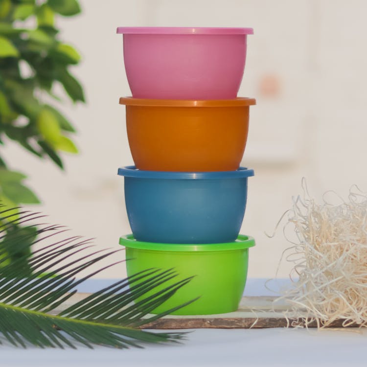 A Stack of Plastic Containers in Different Colors