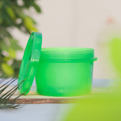 A Green Plastic Container with Lid