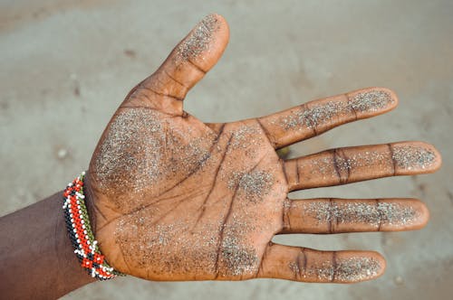 Free Left Human Palm With Sand Stock Photo