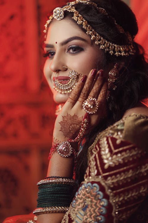 Beautiful Young Woman Wearing Traditional Clothing and Jewelry 