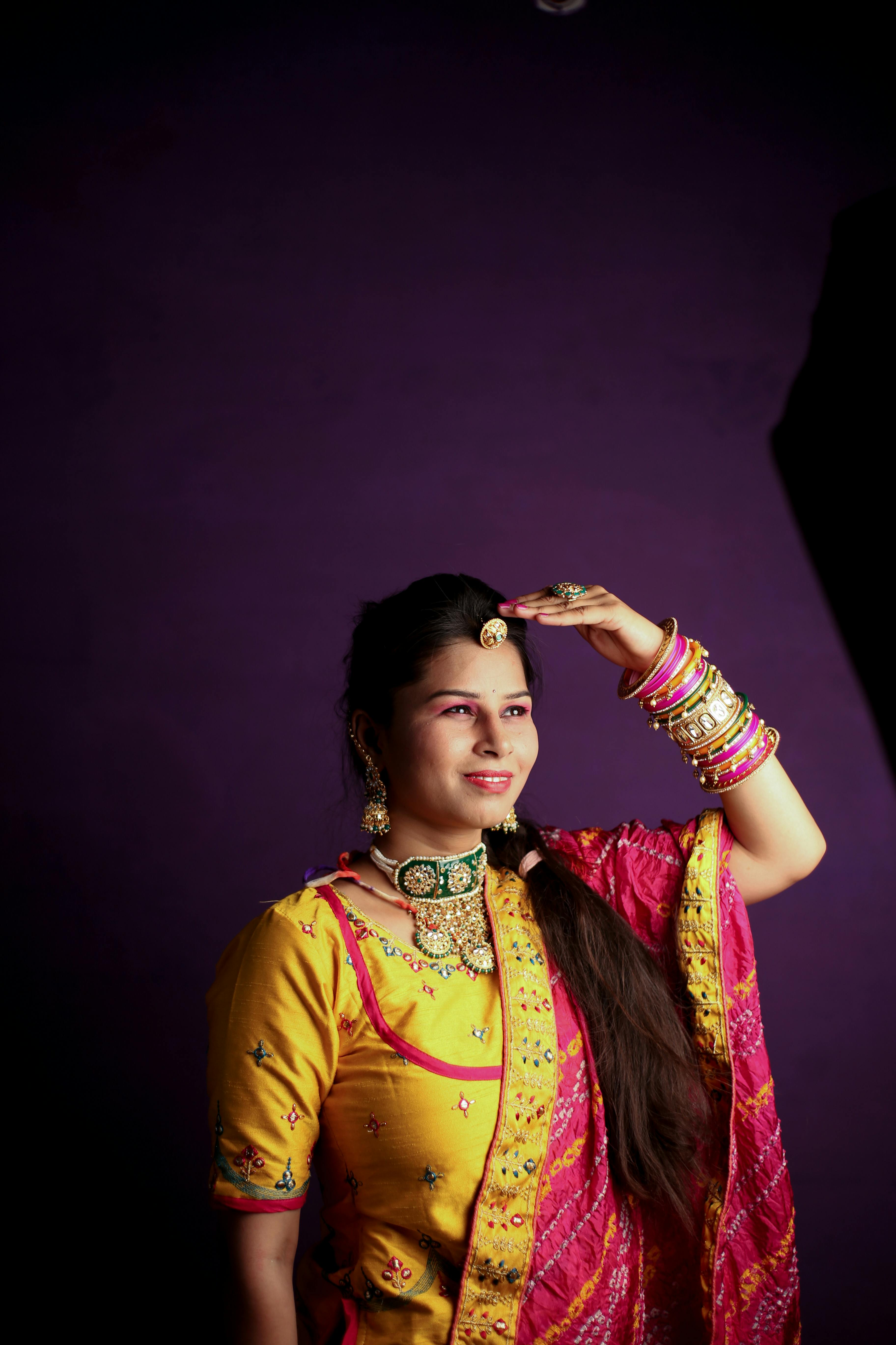 Beautiful Indian traditional girl posing on white background Stock Photo -  Alamy