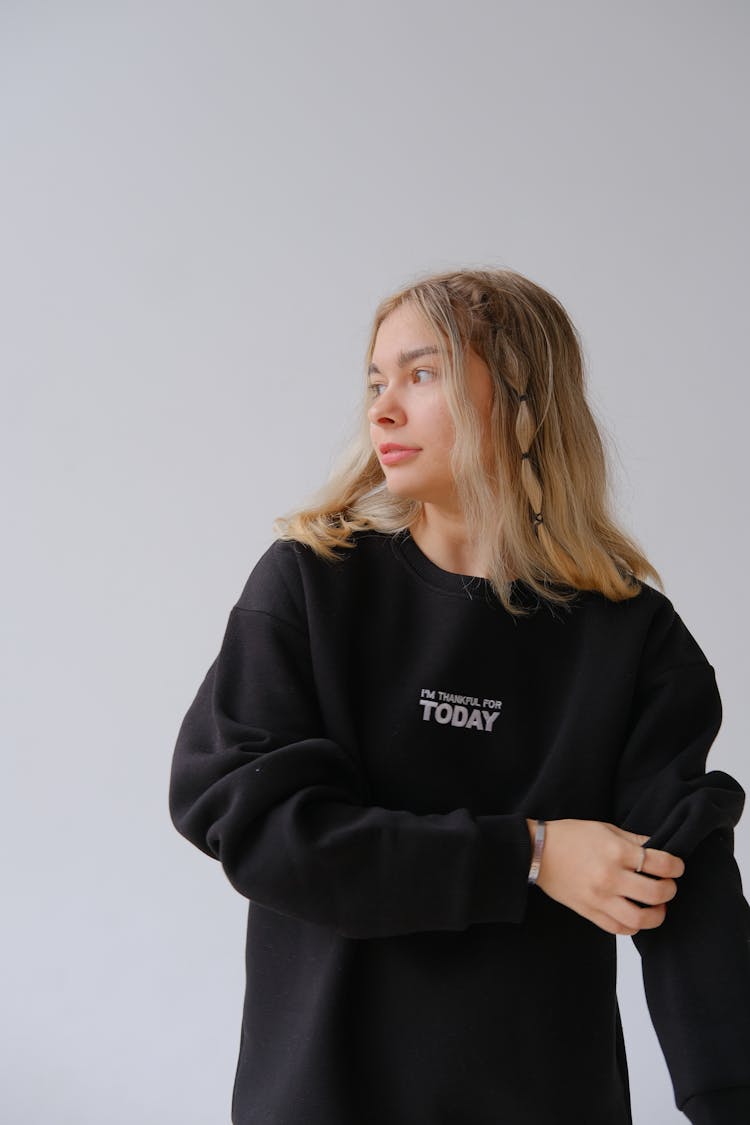 Woman Wearing Black Oversized Jumper