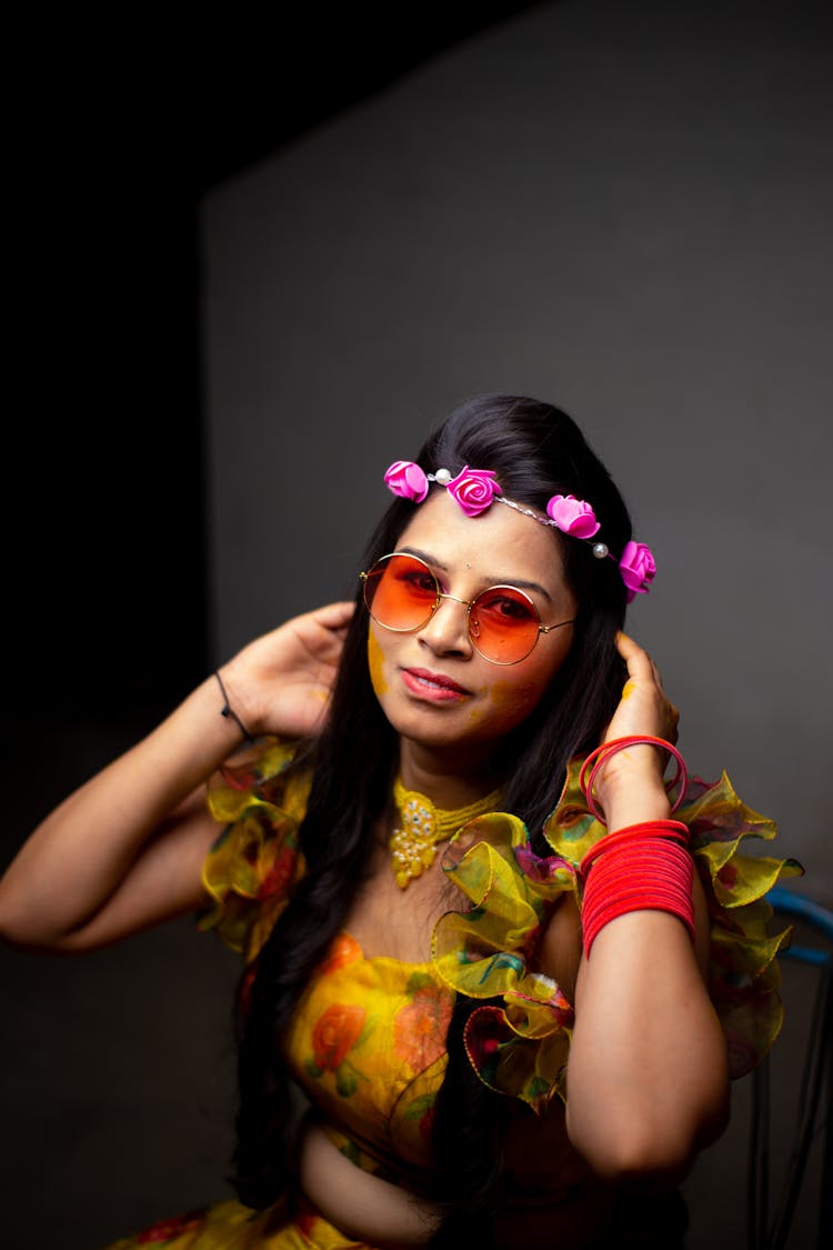 Woman Wearing Flamboyant Outfit And Accessories