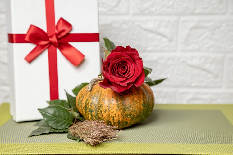 Present And Flower In Fall Decoration On Table