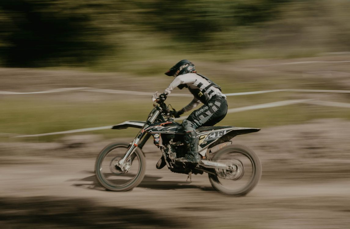 Photo of Man riding a Dirt Bike · Free Stock Photo