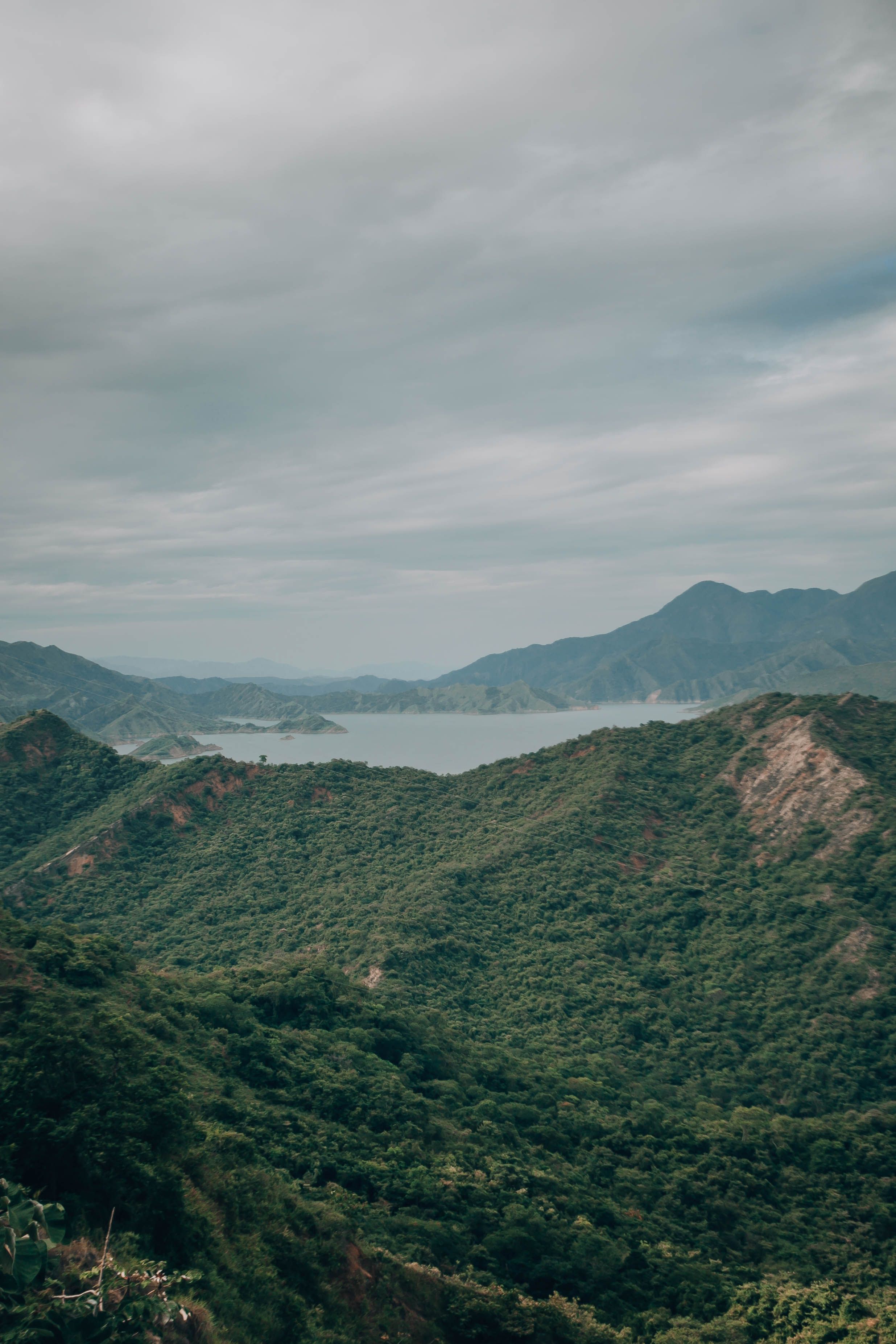 Aerial Photography of Green Mountains under the Cloudy Sky · Free Stock ...
