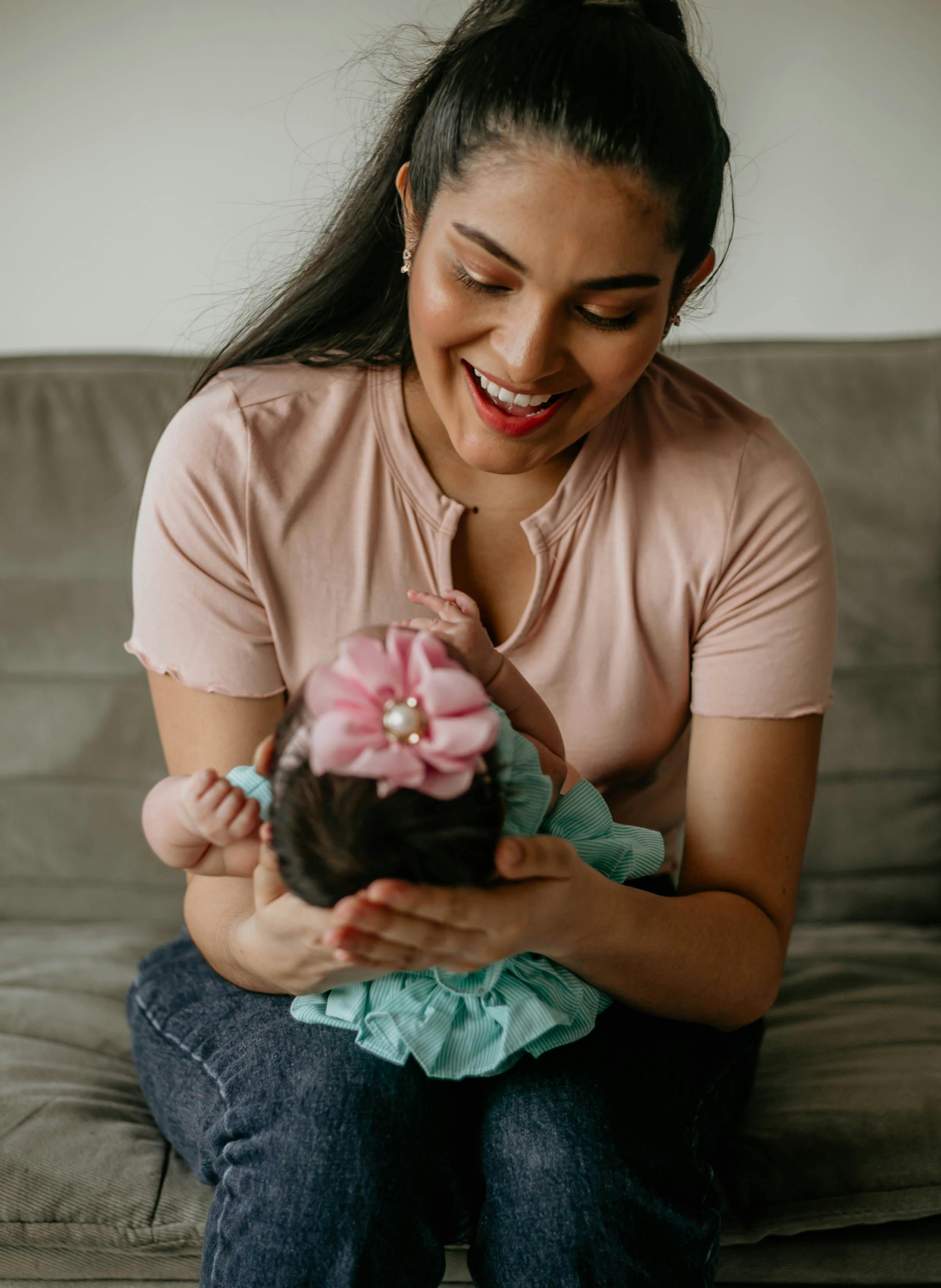 a woman holding her child