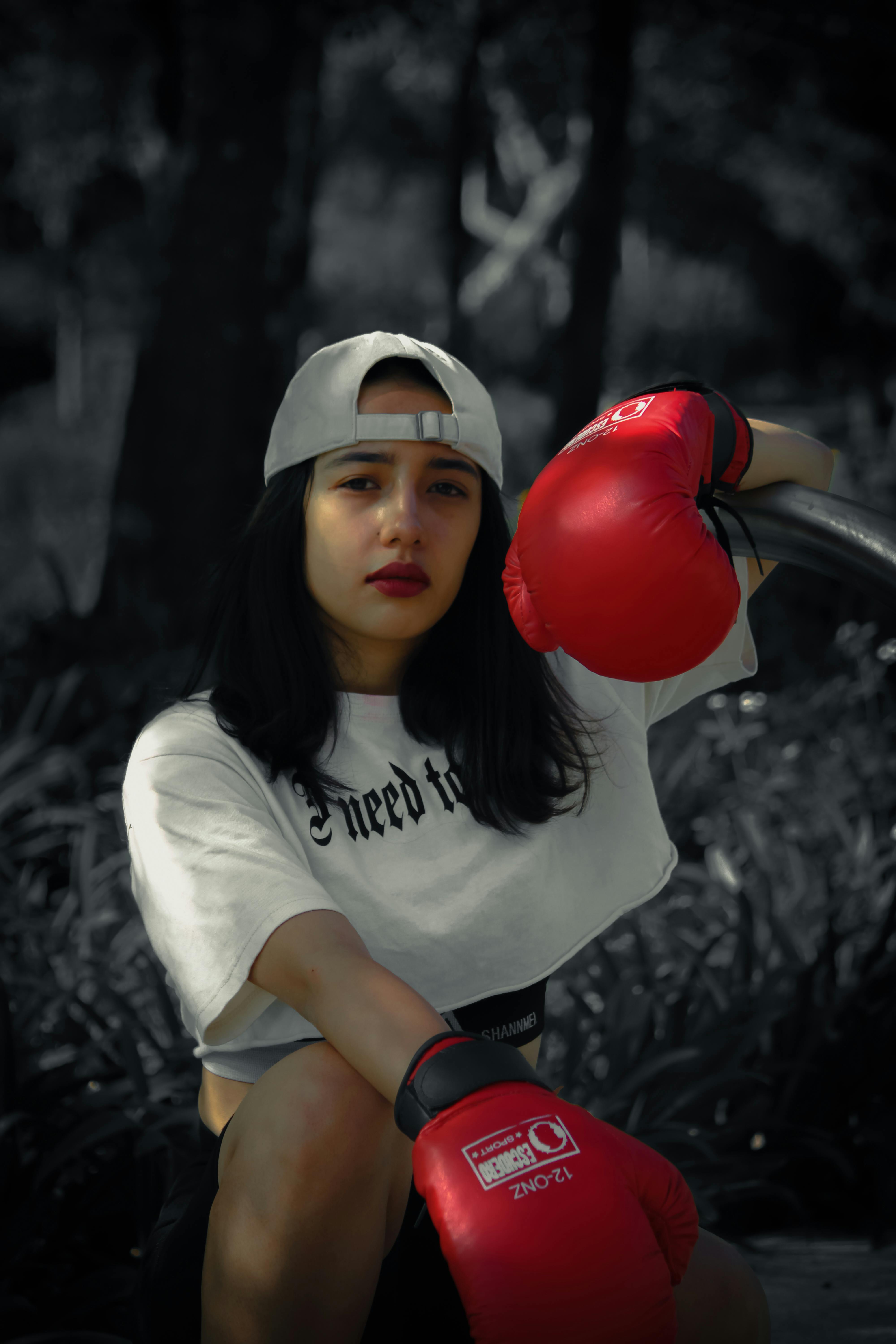 Woman in White Crop Top Wearing Red Boxing Gloves · Free Stock Photo