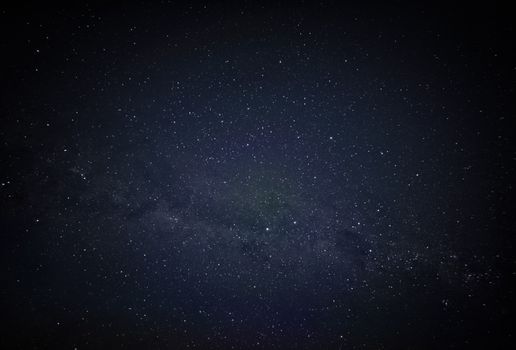 Captivating view of the night sky full of stars and constellations against a dark backdrop.