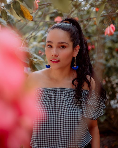 Young Brunette in Checked Blouse