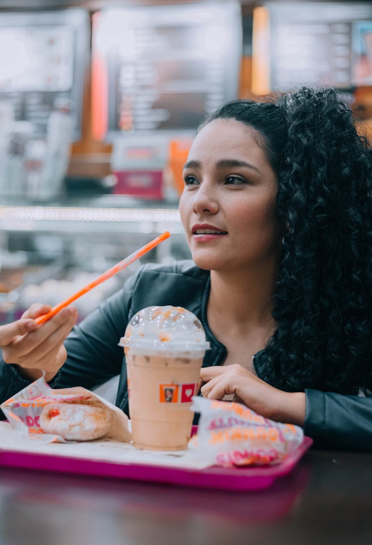 Woman Eating A Fast Food