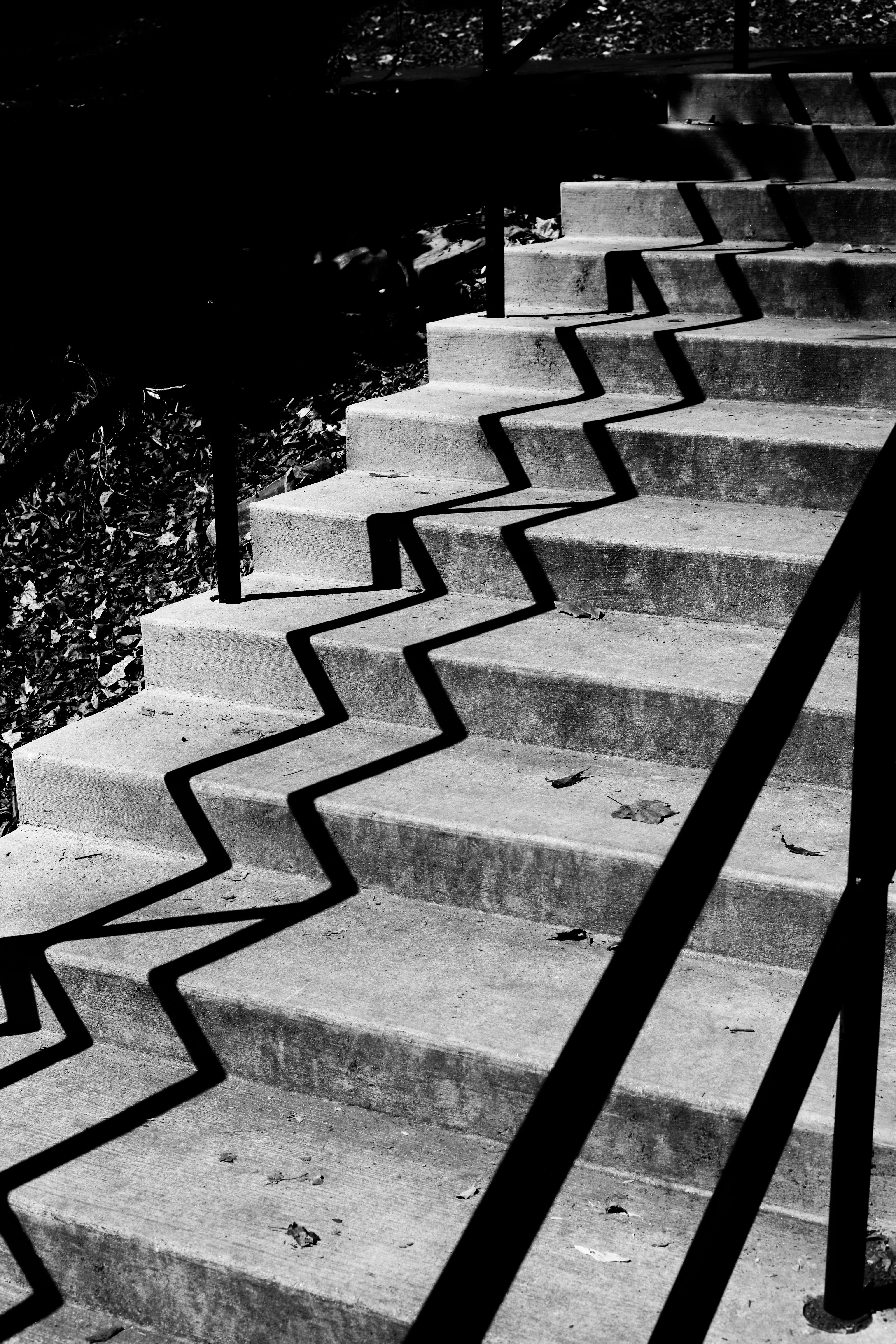 Grayscale Photo of Concrete Staircase · Free Stock Photo
