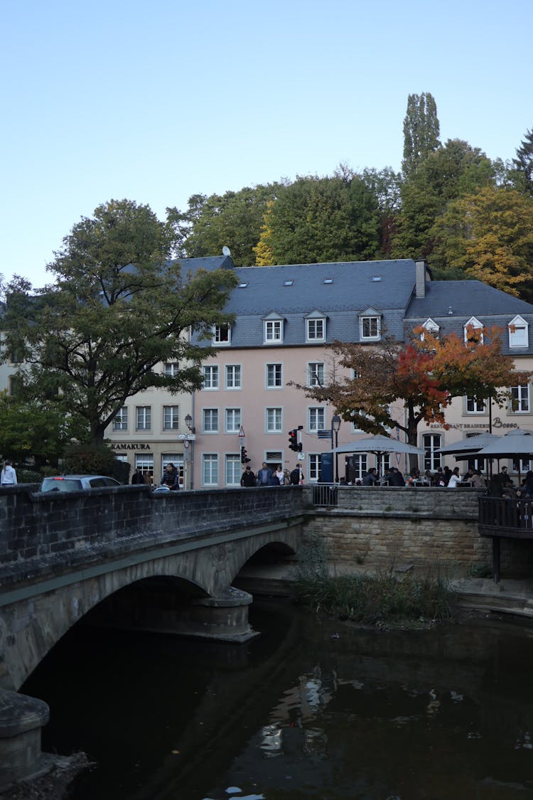 Stone Bridge Above River In City