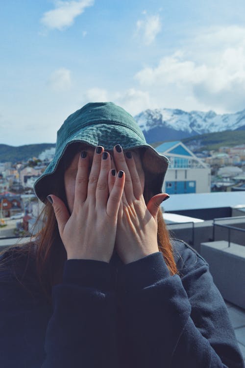 Woman Covering her Face