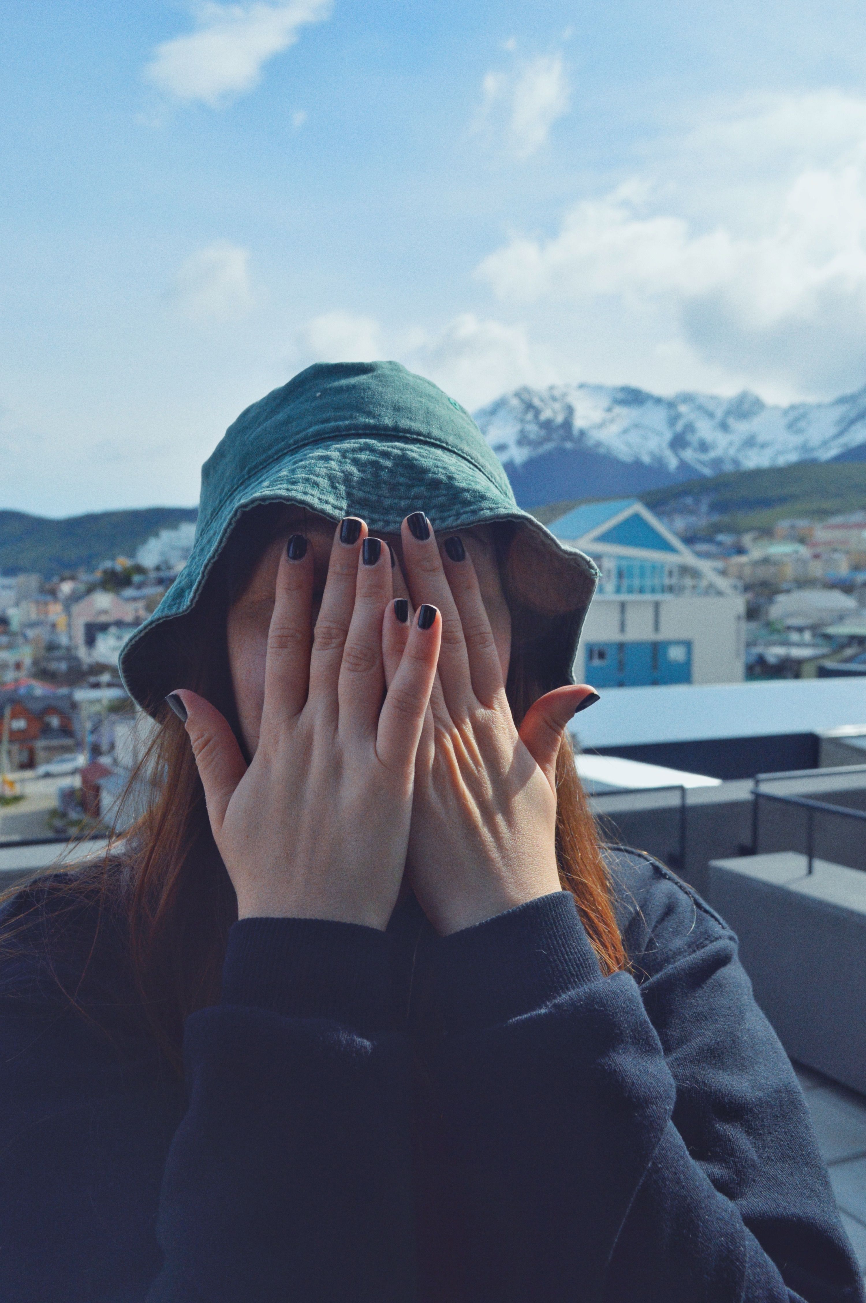 Photo of a Woman Covering Her Face with Her Hand · Free Stock Photo