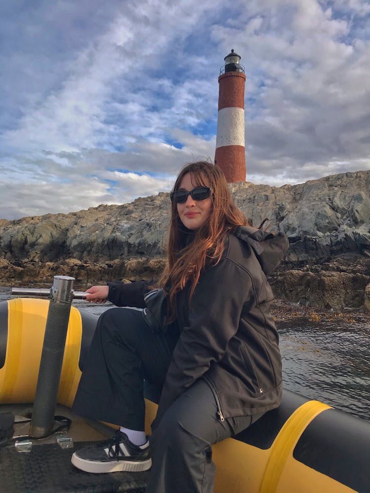 Woman Steering Boat