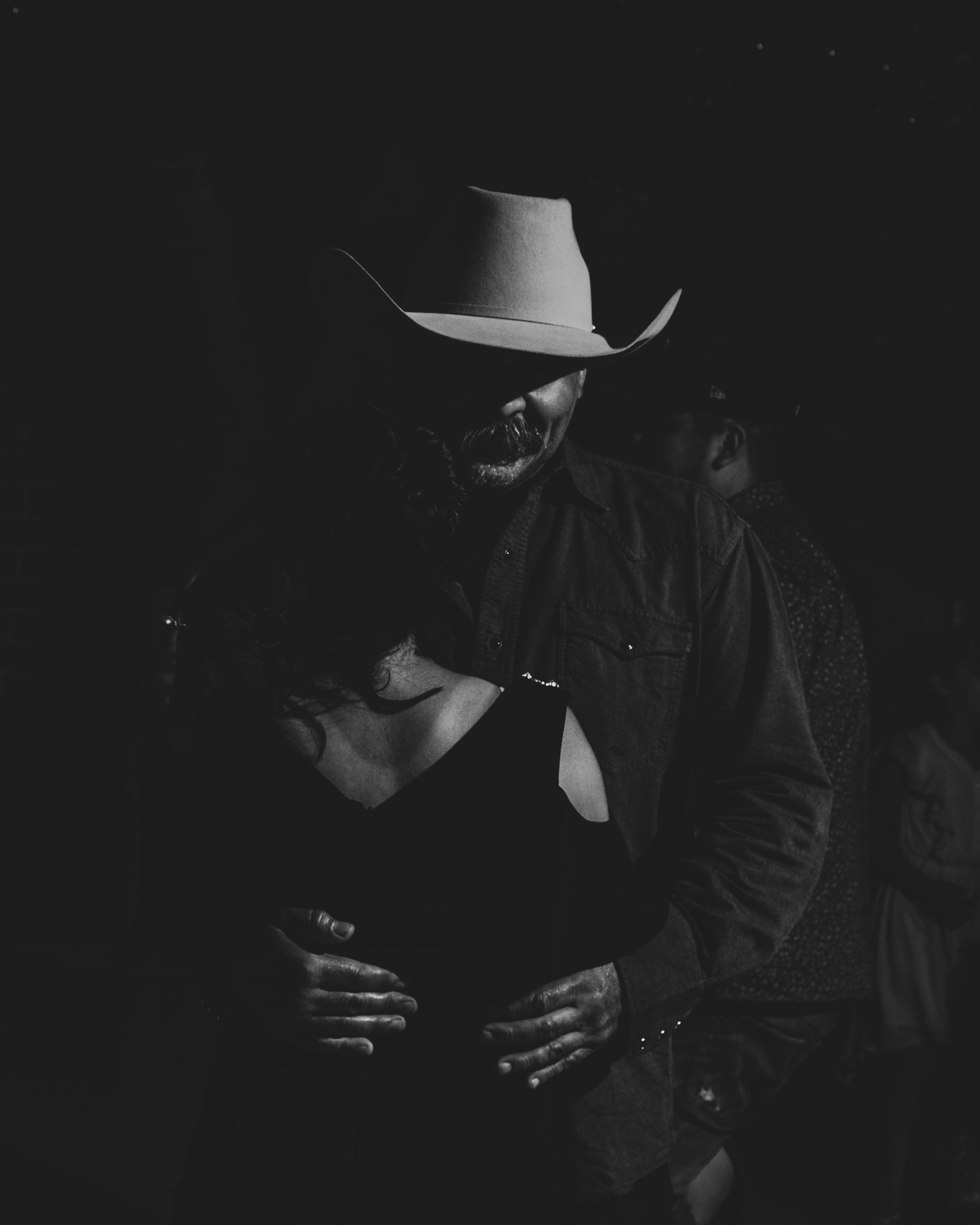 Man Hugging Woman in Black and White · Free Stock Photo