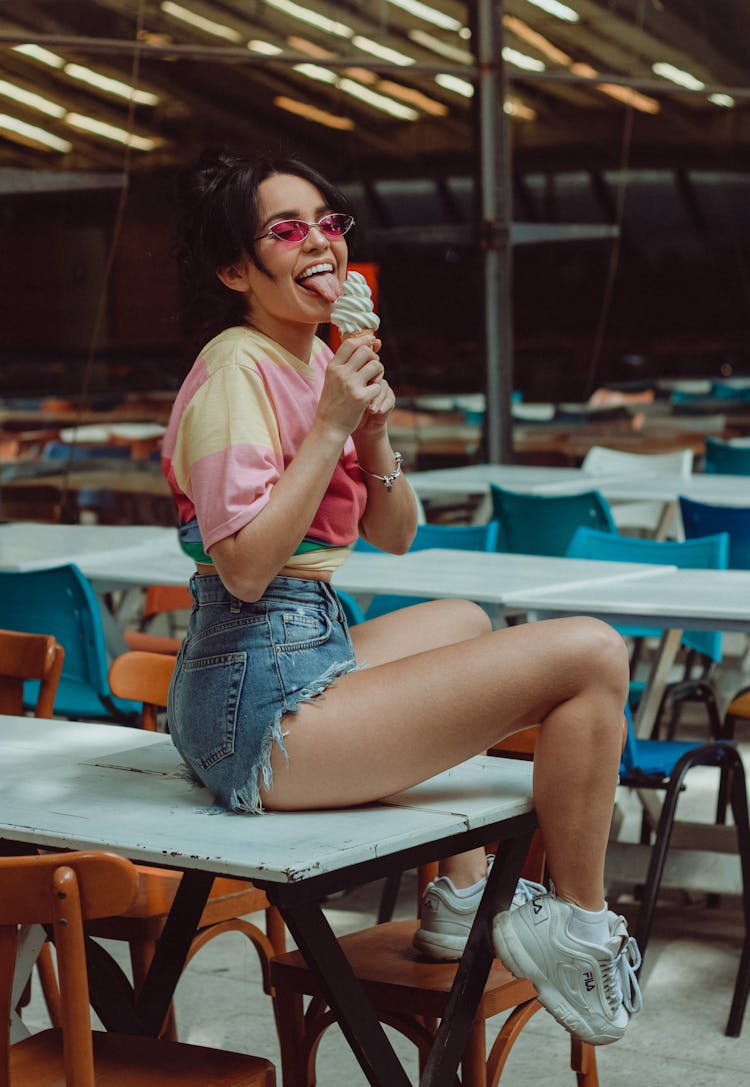 A Woman Eating An Ice Cream